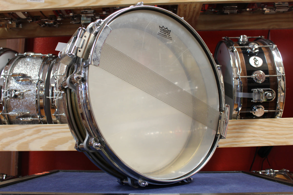 2000s Pearl 3.5x14 Piccolo Free Floater Brass Snare Drum