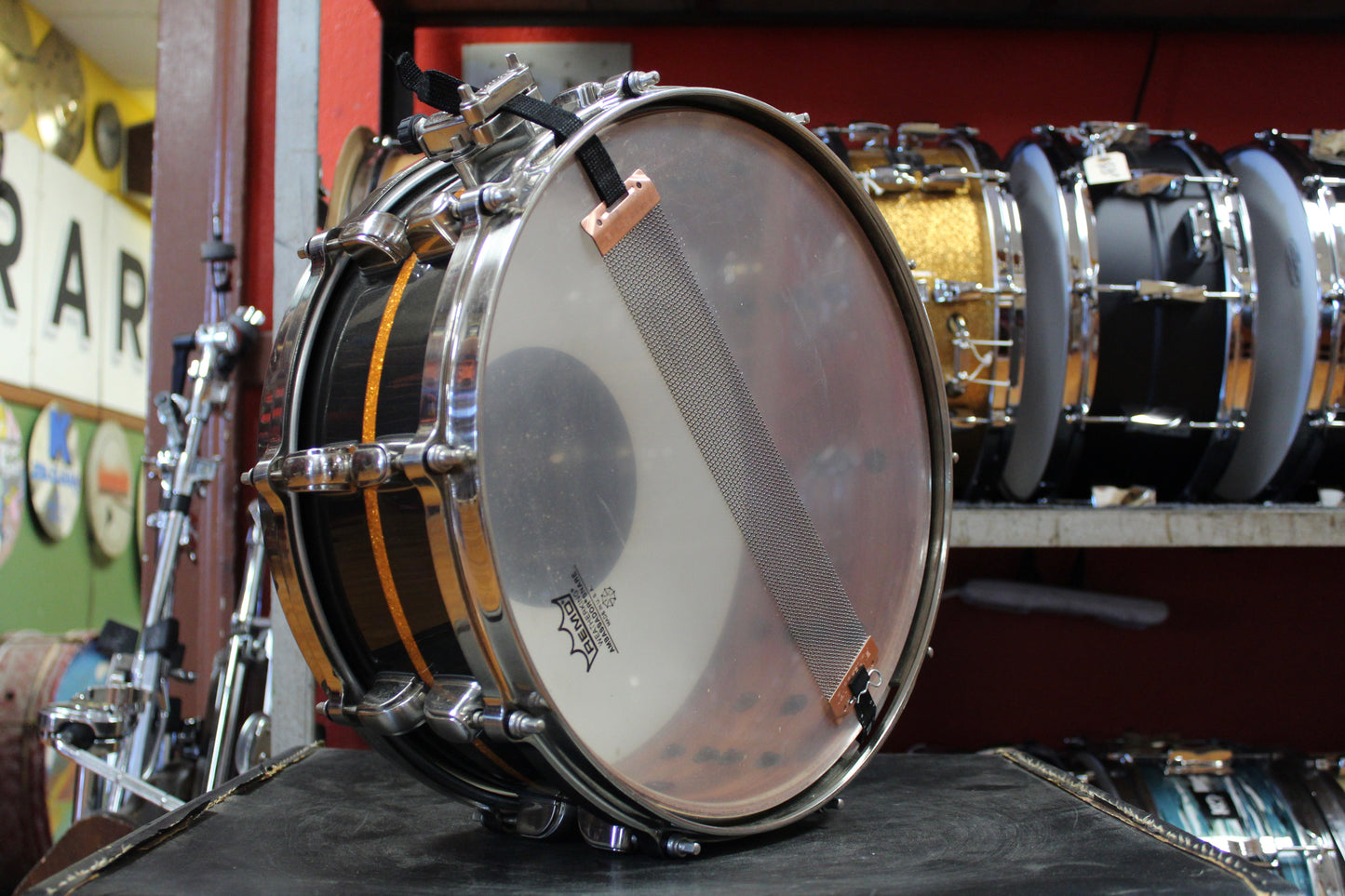 Tama 5.5x14 Starclassic Bubinga Elite Snare Drum in Metallic Black with Gold Inlay